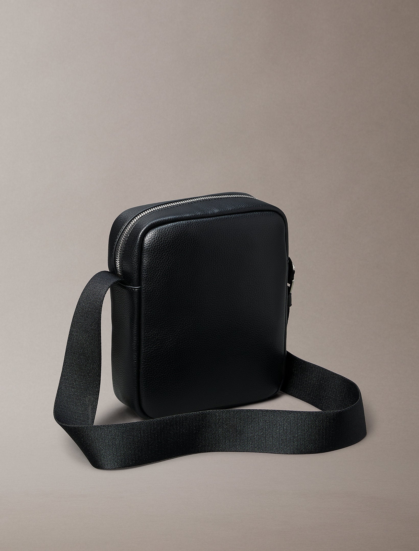 Calvin Klein Raised Reporter Bag