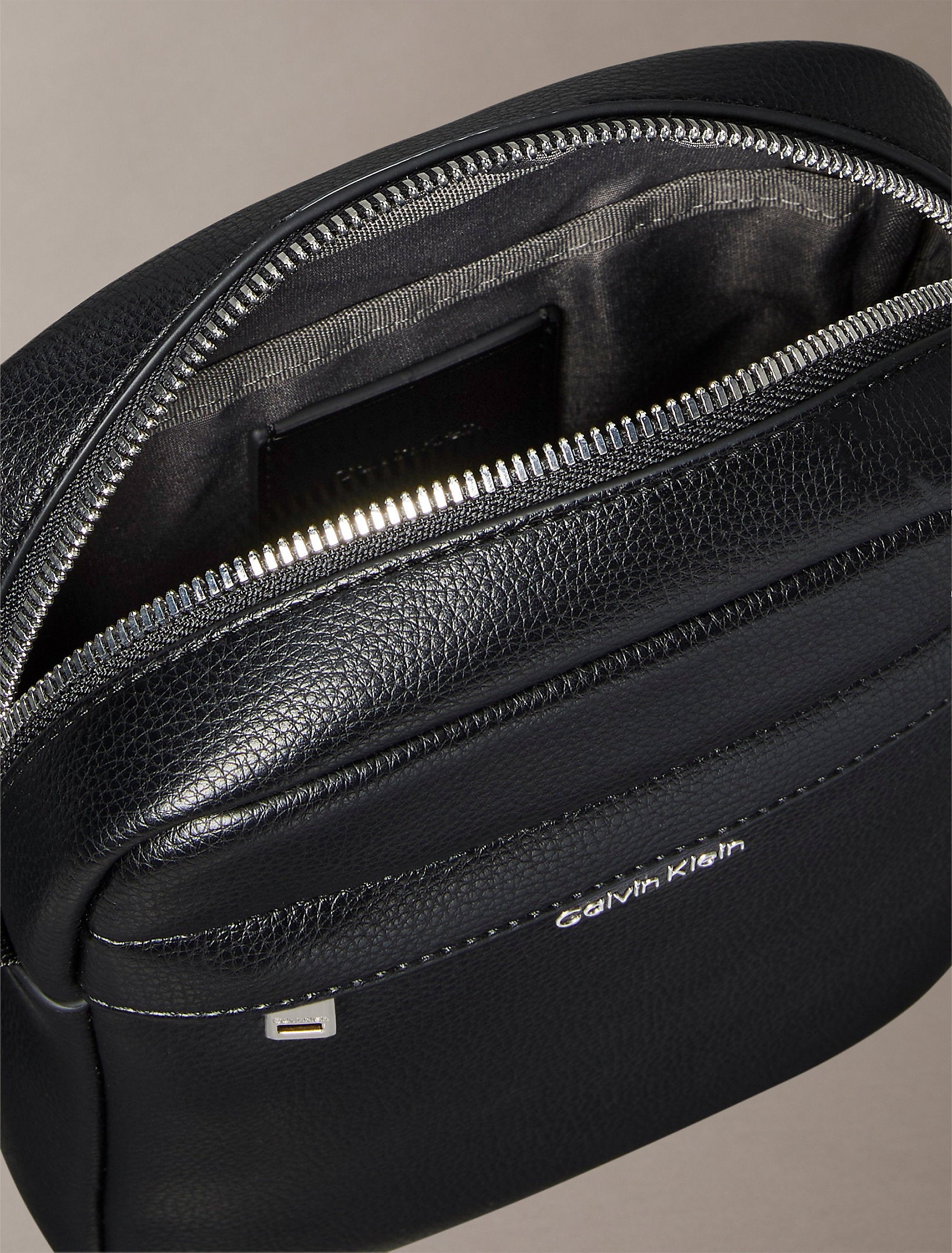 Calvin Klein Raised Reporter Bag