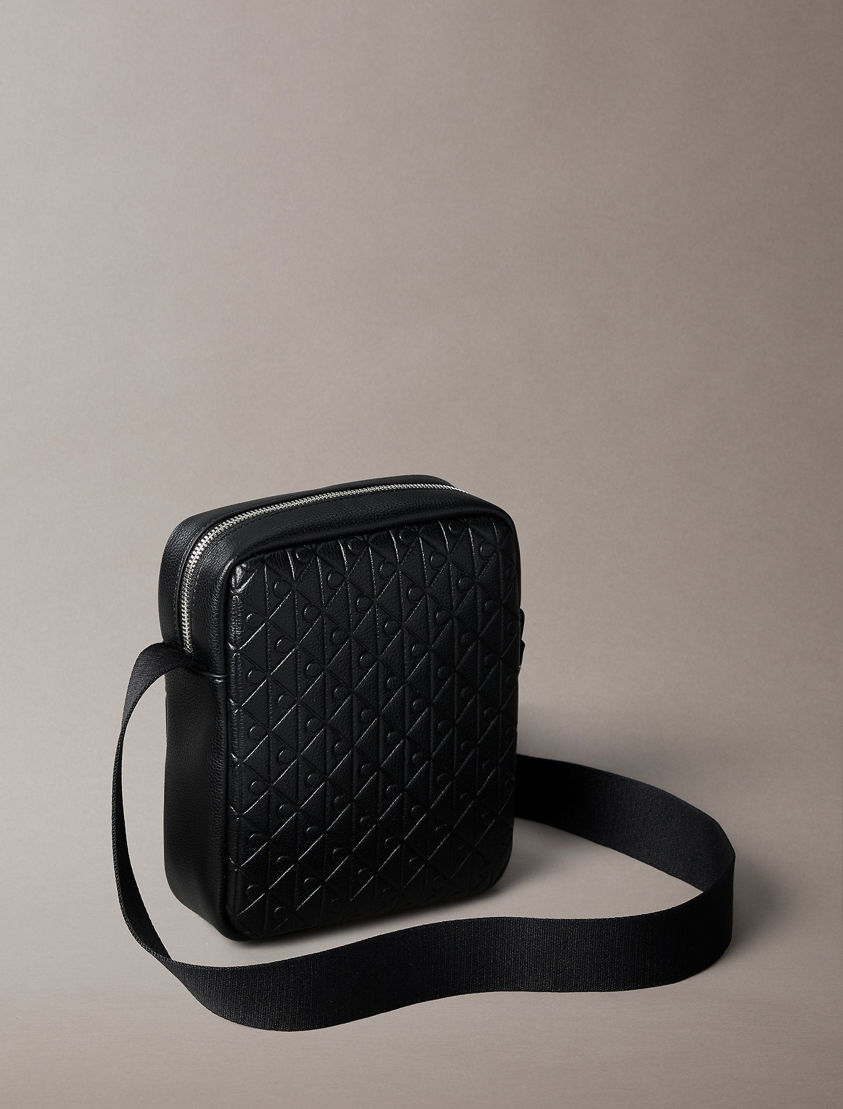 Calvin Klein Emblem Emboss Reporter Bag