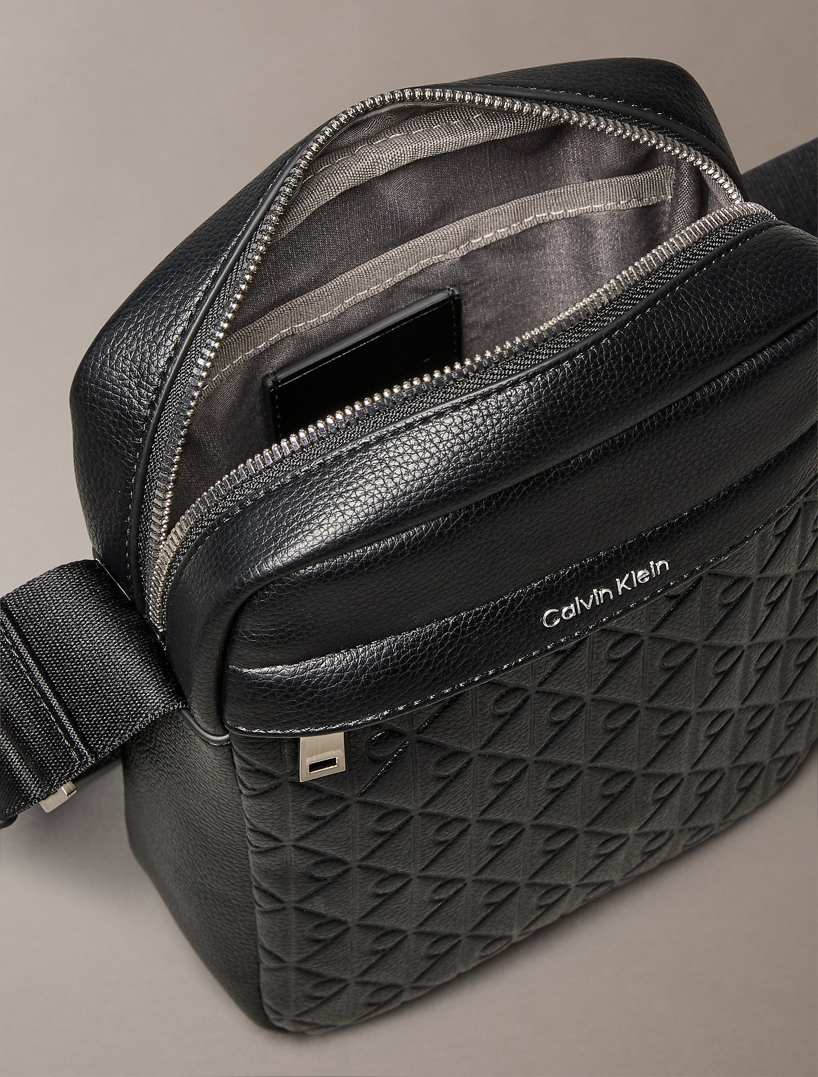 Calvin Klein Emblem Emboss Reporter Bag