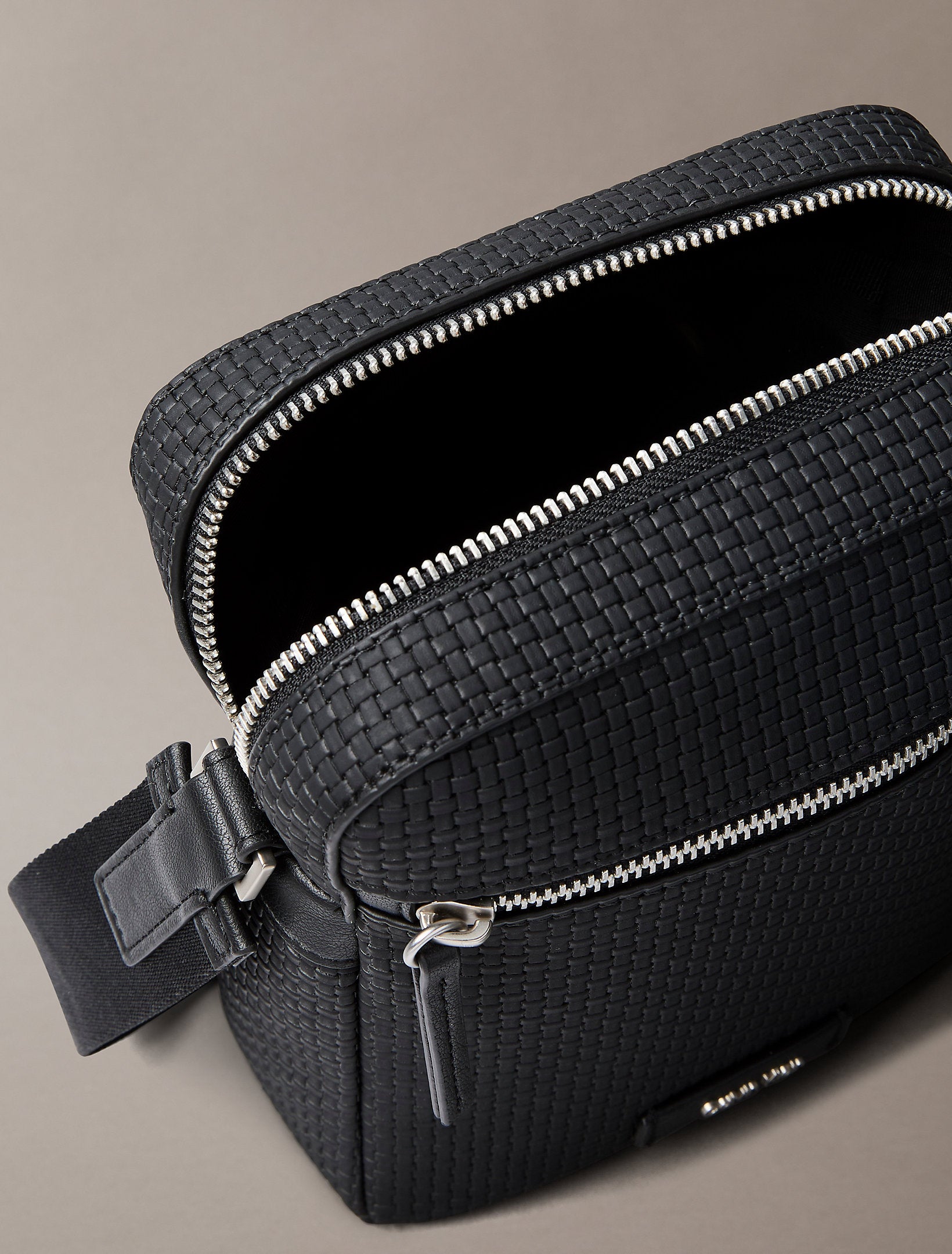 Calvin Klein Embossed Woven Reporter Bag