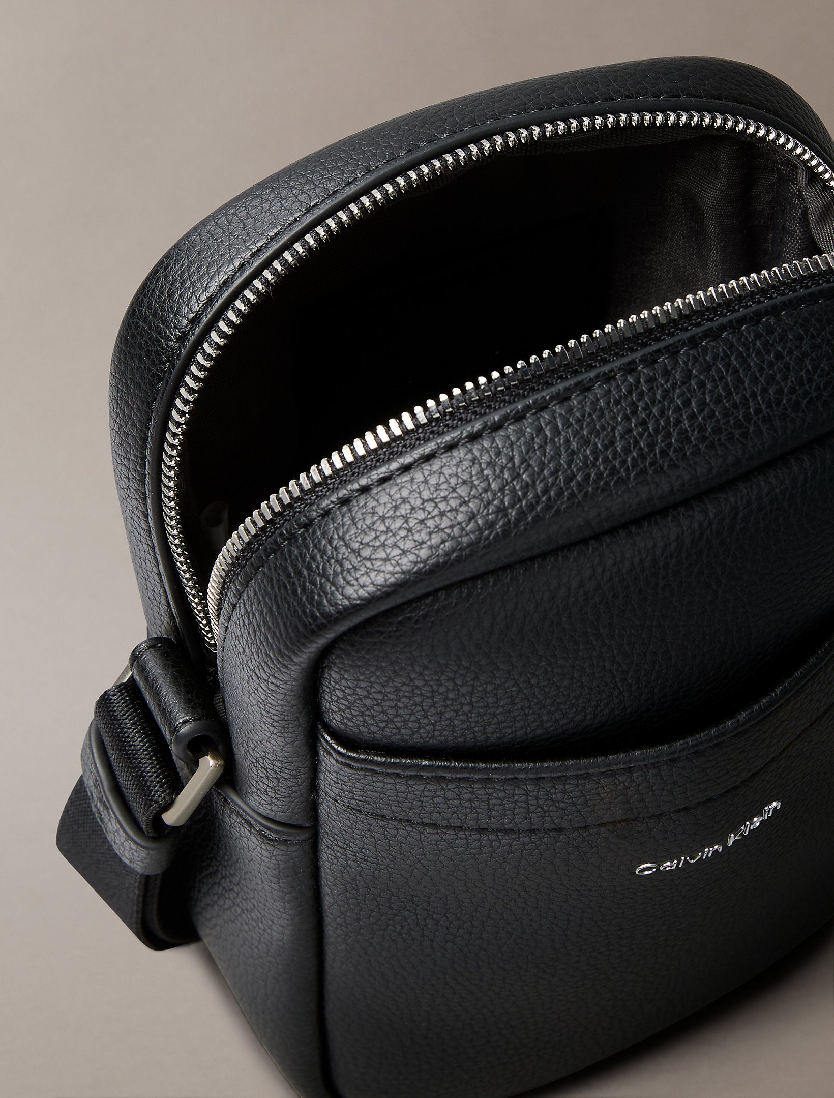 Calvin Klein Raised Slim Reporter Bag