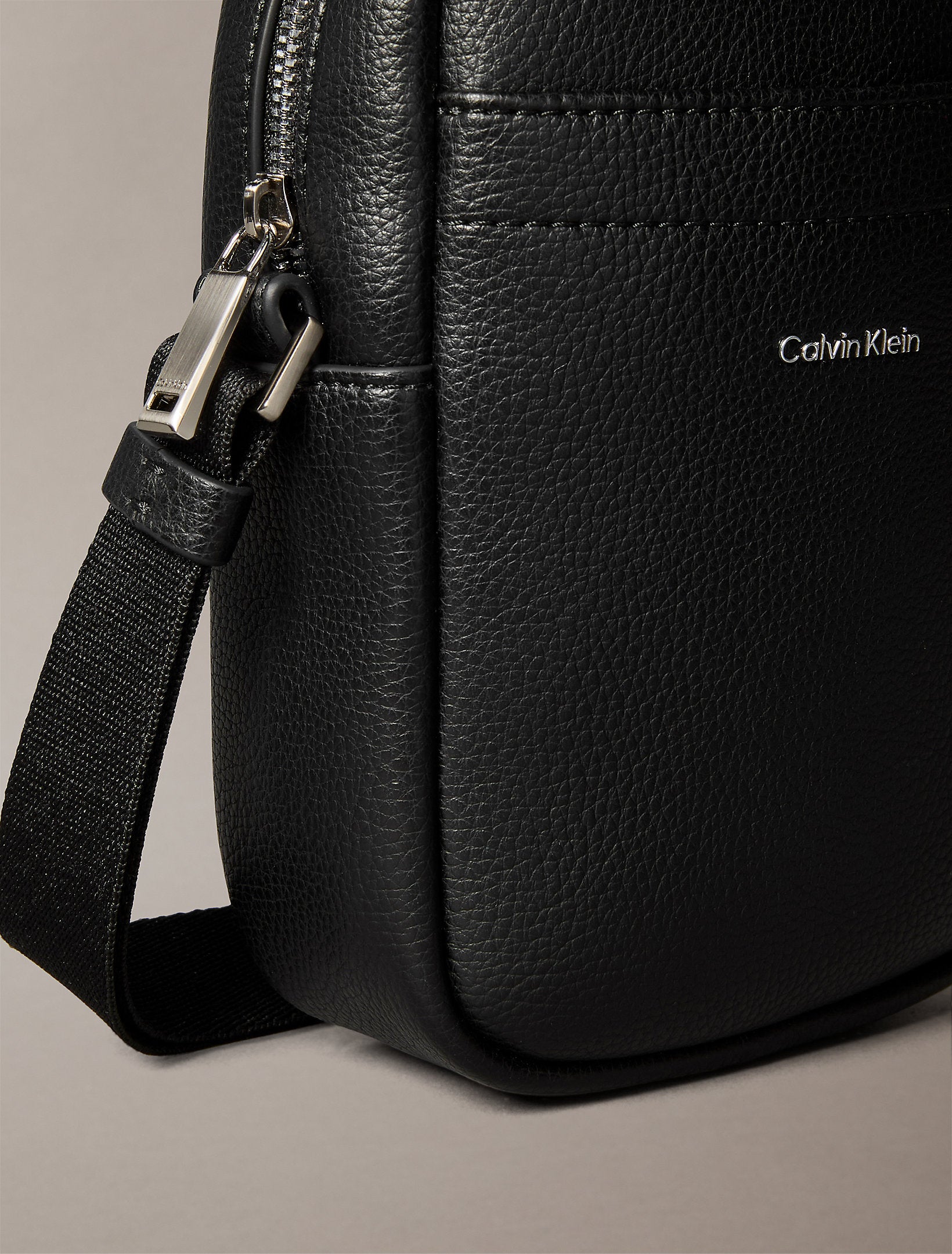 Calvin Klein Raised Slim Reporter Bag