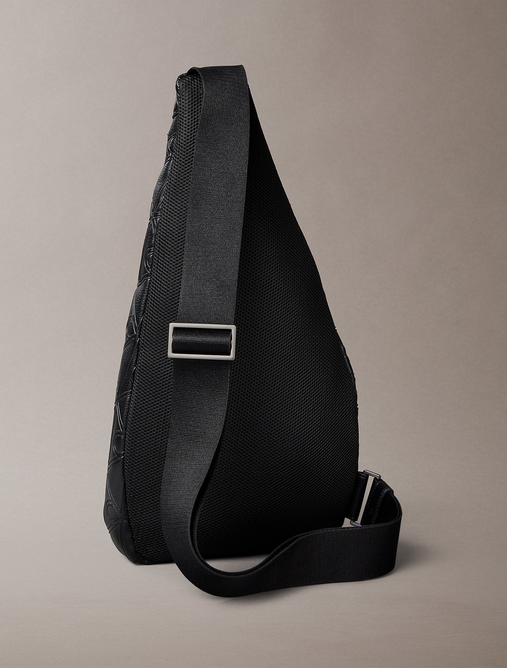 حقيبة كالفين كلاين Emblem Aop Deboss Ns Sling