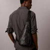 حقيبة كالفين كلاين Emblem Aop Deboss Ns Sling