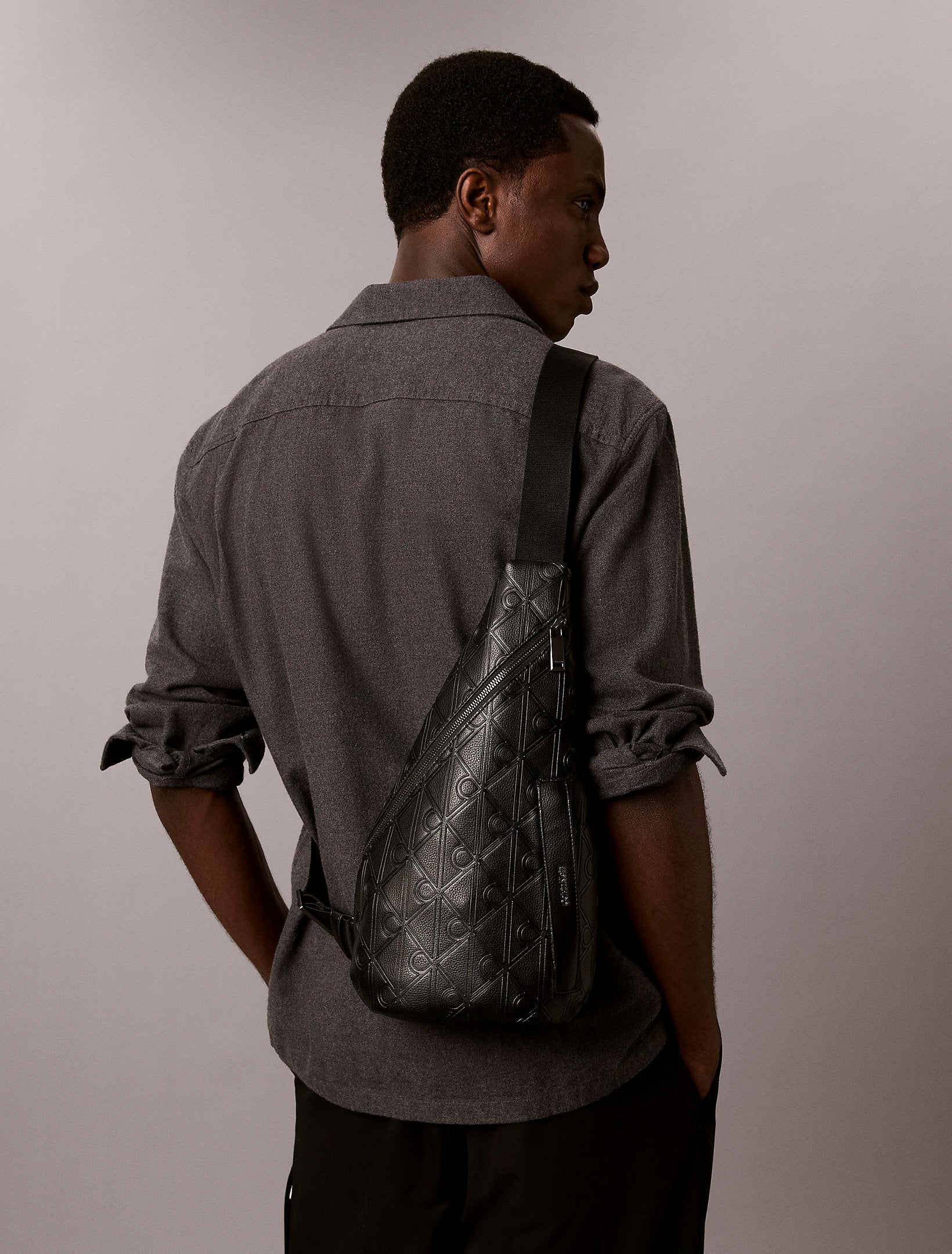 حقيبة كالفين كلاين Emblem Aop Deboss Ns Sling