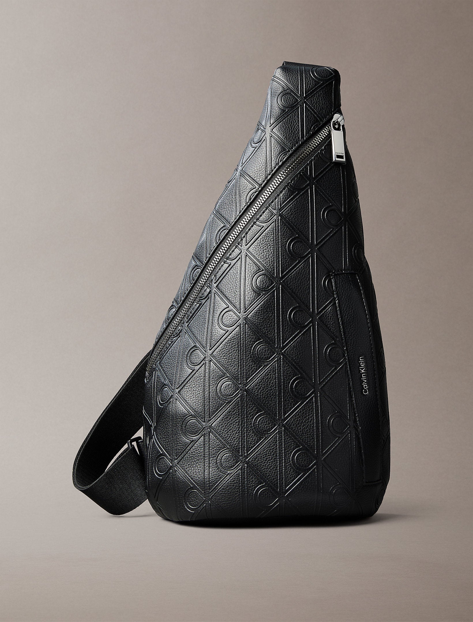 حقيبة كالفين كلاين Emblem Aop Deboss Ns Sling
