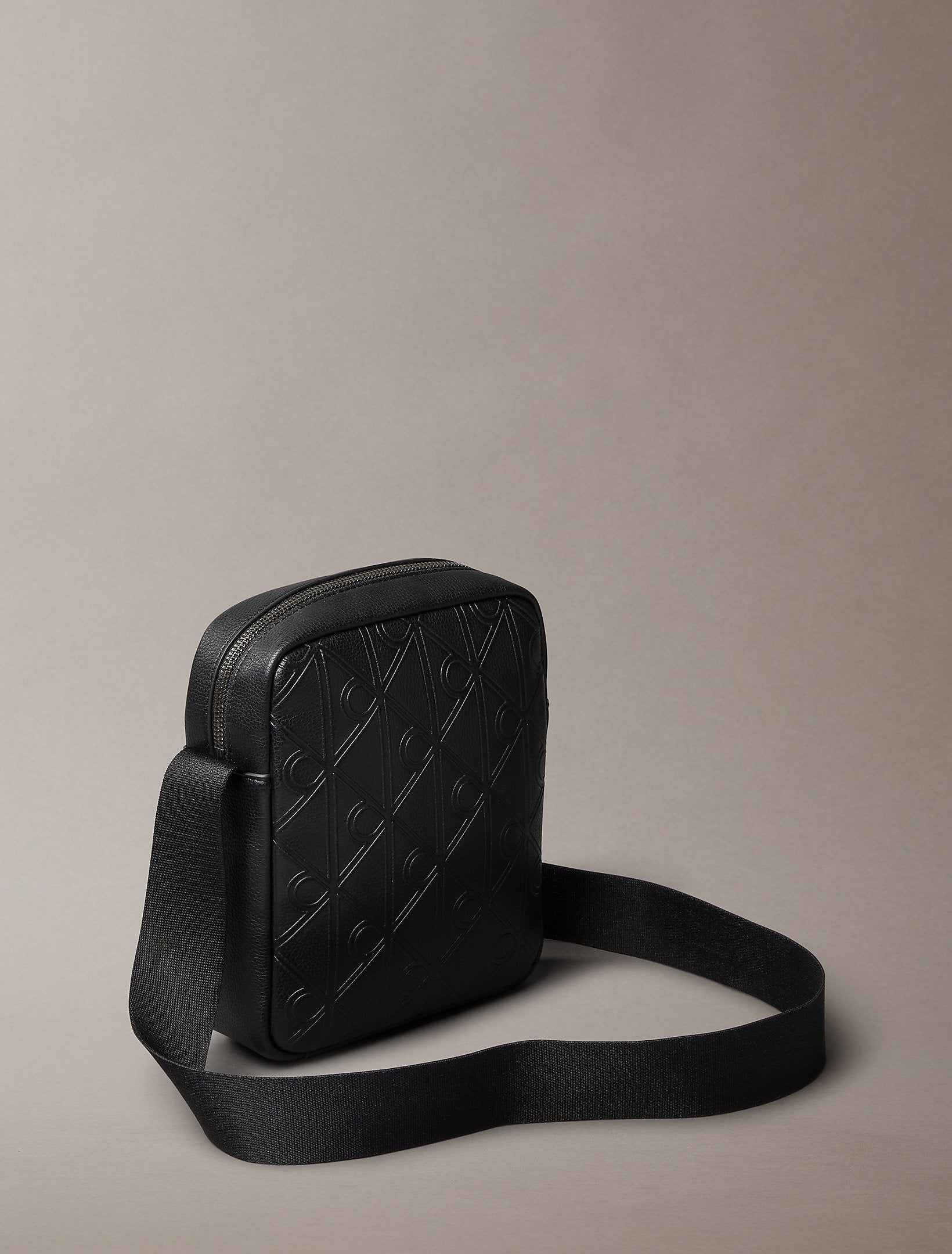 Calvin Klein Emblem Aop Deboss Reporter Bag