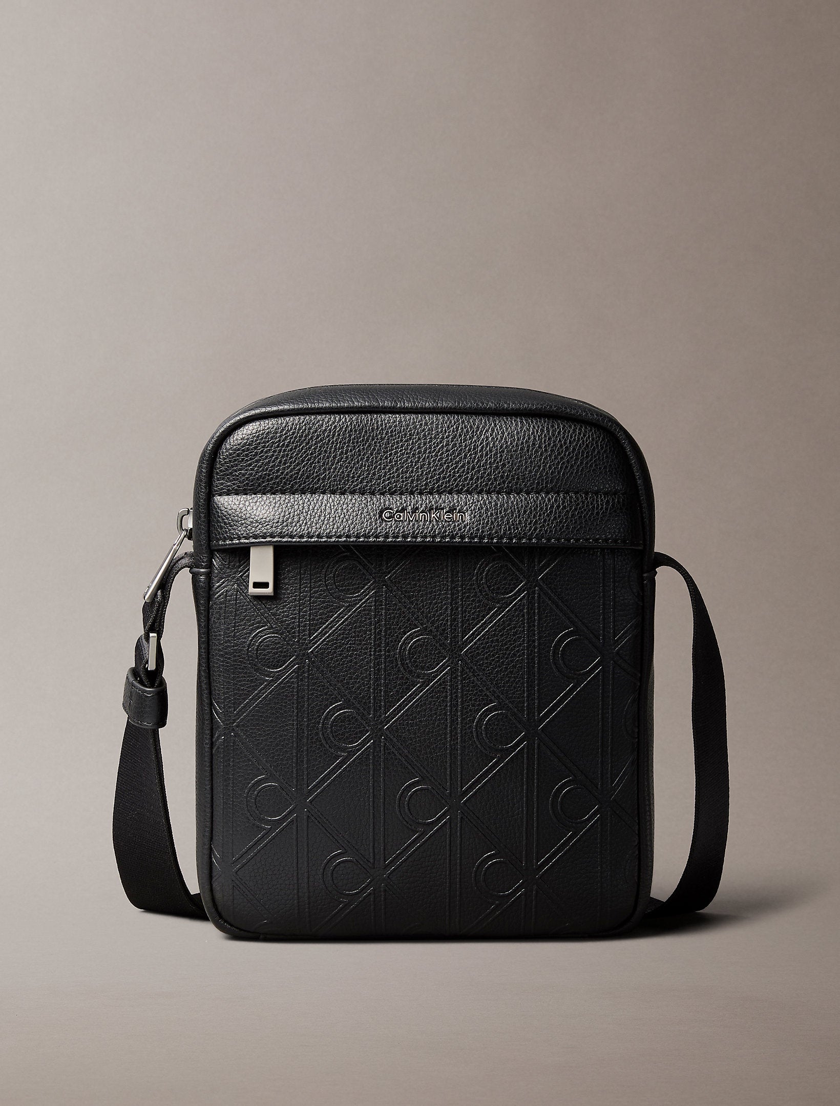 Calvin Klein Emblem Aop Deboss Reporter Bag